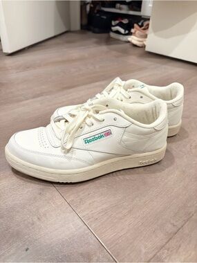 Reebok women’s Off-White Leather Low-Top Sneakers with Teal Logo